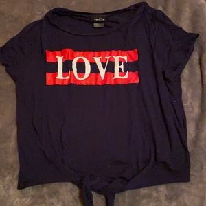 Dark blue shirt , ties in front